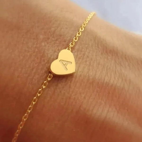 Gold bracelet with letter pendant