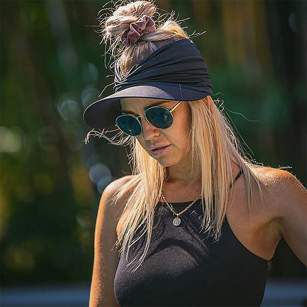 Elastic cap with hole for hair